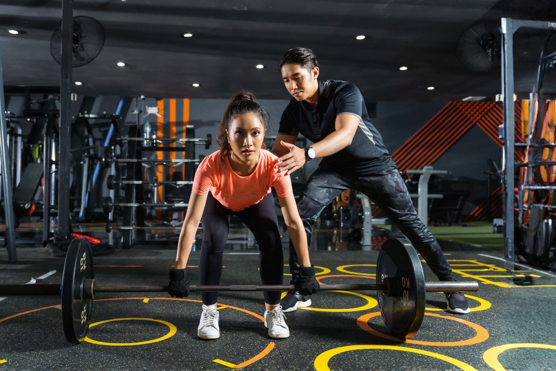 Revamp Executive trainer with client doing strength training